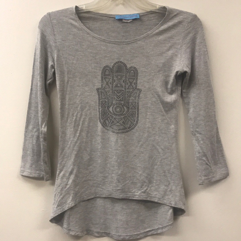 A three quarter sleeve shirt with hamsa. Jr large